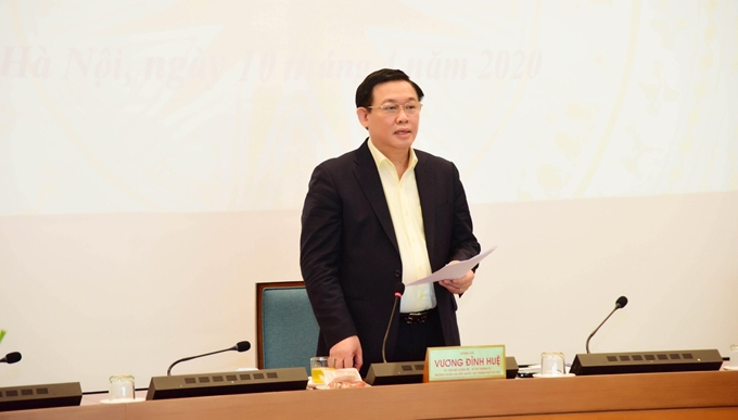  Bí thư Thành ủy Hà Nội Vương Đình Huệ đề nghị Ban Chỉ đạo phòng, chống dịch bệnh COVID-19 của Thành phố đề xuất với Thủ tướng Chính phủ kéo dài thời gian thực hiện Chỉ thị số 16 tới ngày 30/4/2020. (Ảnh:TH)
