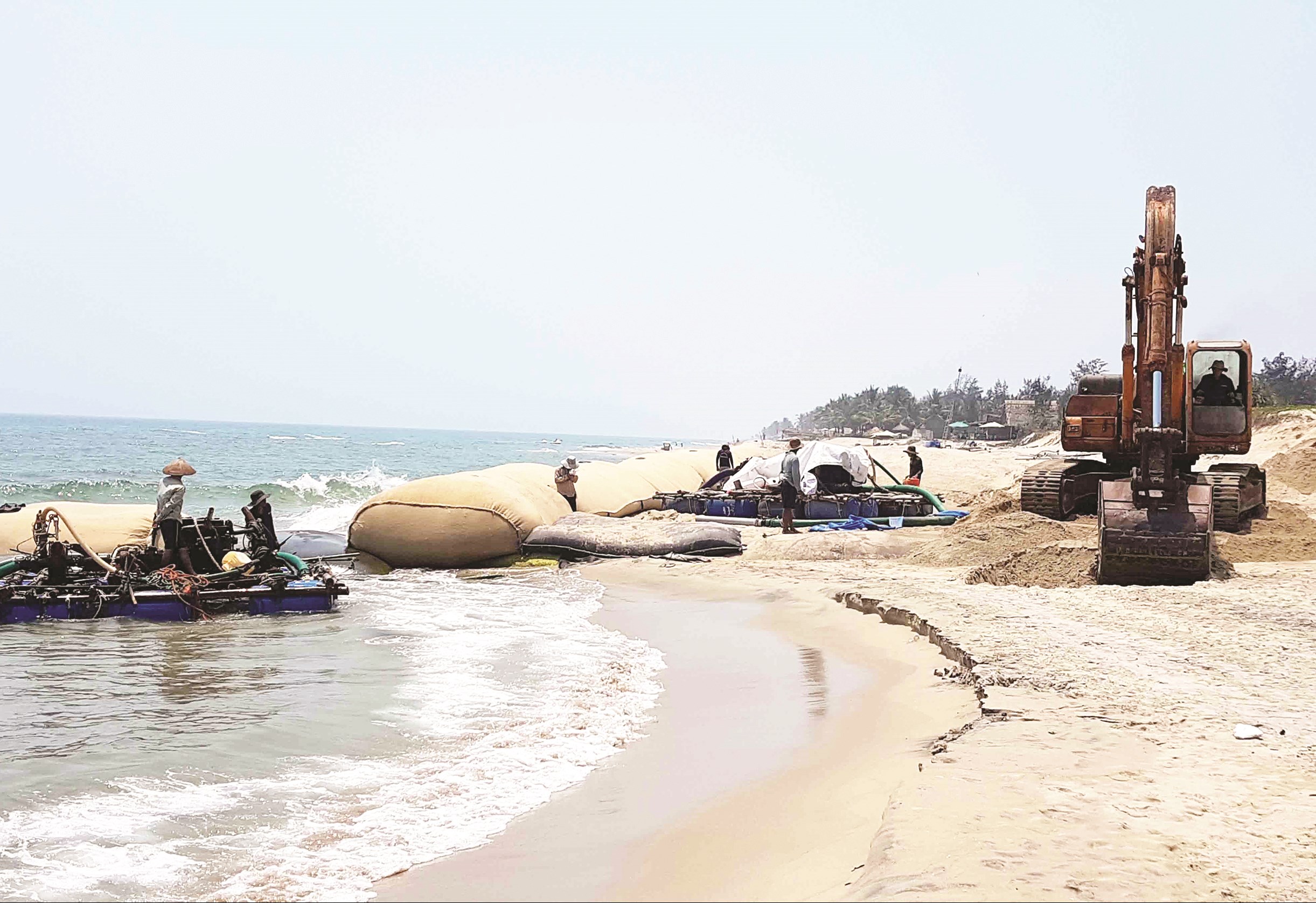 Nhiều dự án triển khai chậm do vướng thủ tục hành chính (Trong ảnh: Công trình chống sạt lở bờ biển của tỉnh Quảng Ngãi đang triển khai).
