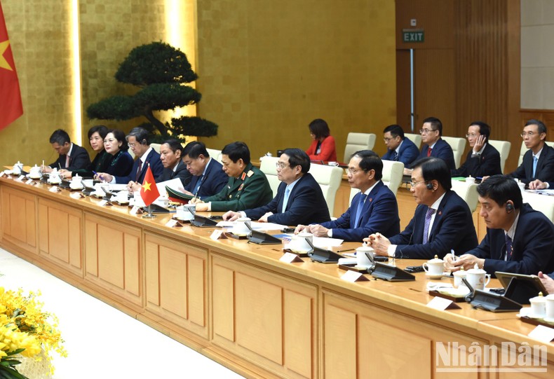Thủ tướng Phạm Minh Chính và các thành viên Chính phủ Việt Nam hội đàm với Thủ tướng Chính phủ nước Cộng hòa Dân chủ Nhân dân Lào Sonexay Siphandone.