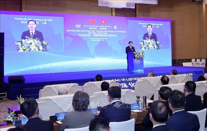 Chủ tịch Quốc hội Vương Đình Huệ phát biểu tại Diễn đàn Chính sách pháp luật thúc đẩy hợp tác đầu tư thương mại Việt Nam - Trung Quốc - Ảnh: TTXVN