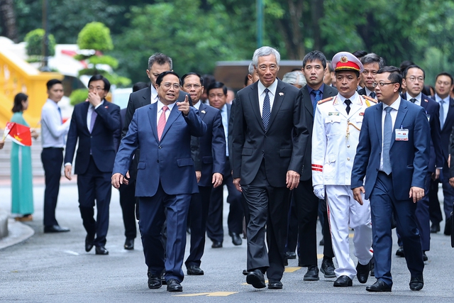 Thủ tướng Phạm Minh Chính chủ trì lễ đón Thủ tướng Singapore Lý Hiển Long - Ảnh 4.