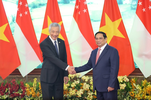Thủ tướng Phạm Minh Chính chủ trì lễ đón Thủ tướng Singapore Lý Hiển Long - Ảnh 7.