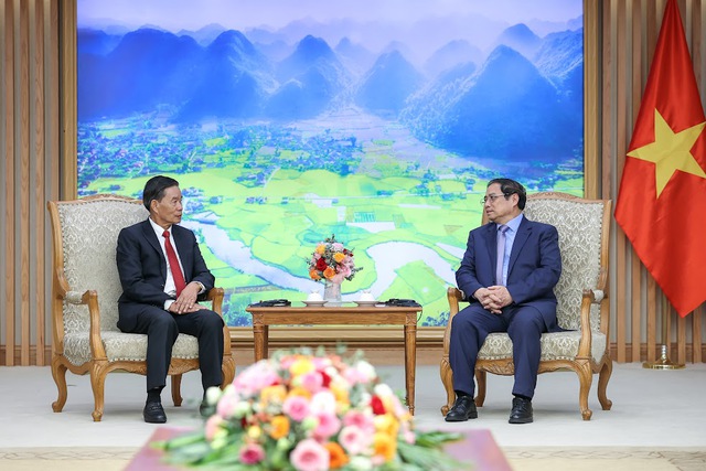 Thủ tướng Phạm Minh Chính tiếp Chủ tịch Ủy ban Trung ương Mặt trận Lào xây dựng đất nước - Ảnh 2.