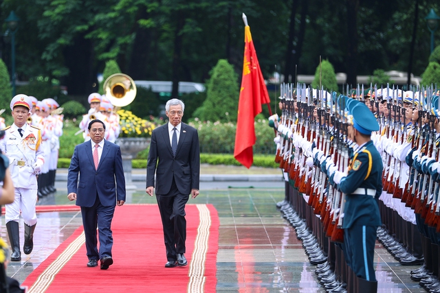 Thủ tướng Phạm Minh Chính chủ trì lễ đón Thủ tướng Singapore Lý Hiển Long - Ảnh 3.