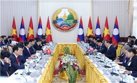 Dành ưu tiên cao nhất cho việc củng cố, vun đắp quan hệ Việt Nam - Lào