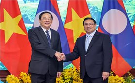Lễ đón Thủ tướng Chính phủ nước Cộng hòa Dân chủ Nhân dân Lào Sonexay Siphandone và Phu nhân