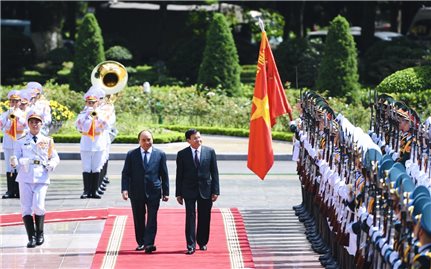 Chủ tịch nước Nguyễn Xuân Phúc chủ trì Lễ đón Tổng Bí thư, Chủ tịch nước Lào