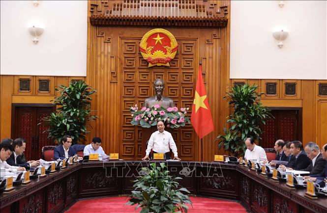 Thủ tướng Nguyễn Xuân Phúc chủ trì cuộc họp với lãnh đạo các bộ, ngành chuẩn bị cho cuộc họp của Ủy ban hợp tác liên Chính phủ Việt Nam - Lào. Ảnh: Thống Nhất/TTXVN