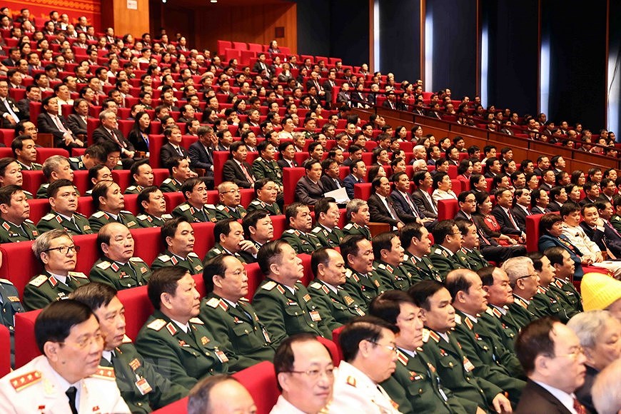 Đoàn đại biểu Đảng bộ Quân đội dự phiên khai mạc Đại hội. (Ảnh: TTXVN)