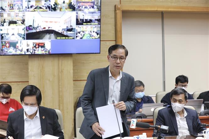 Ông Đặng Quang Tấn, Cục trưởng Cục Y tế dự phòng (Bộ Y tế) báo cáo tình hình dịch COVID-19 tại Hải Dương và Quảng Ninh tại Hội nghị trực tuyến về phòng, chống COVID-19 ngày 28/1. Ảnh: Minh Quyết /TTXVN