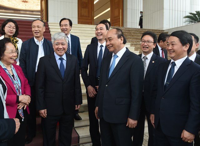 Thủ tướng Nguyễn Xuân Phúc, Bí thư Trung ương Đảng, Bộ trưởng Chủ nhiệm Đỗ Văn Chiến và các đại biểu dự Hội nghị.