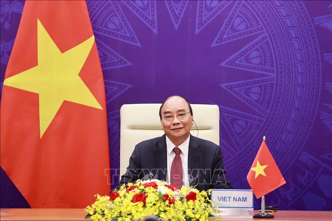Chủ tịch nước Nguyễn Xuân Phúc tại điểm cầu Hà Nội. Ảnh: Thống Nhất/TTXVN