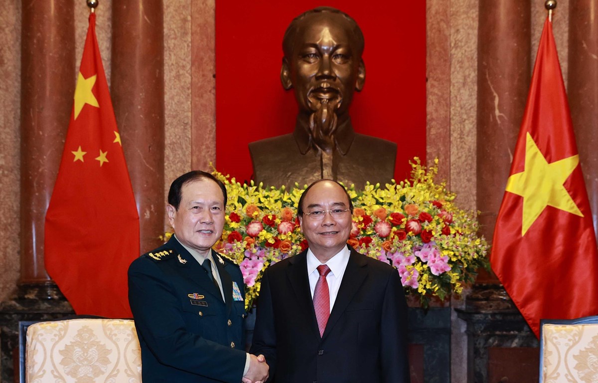 Chủ tịch nước Nguyễn Xuân Phúc tiếp Bộ trưởng Bộ Quốc phòng Trung Quốc Ngụy Phượng Hòa. Ảnh: Thống Nhất/TTXVN