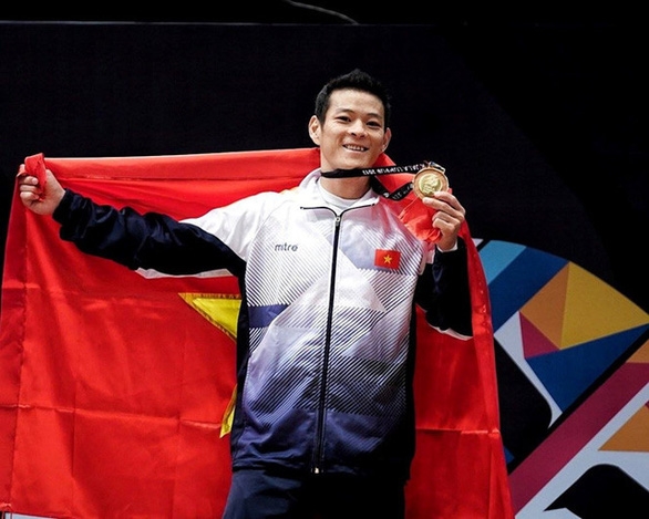 Thạch Kim Tuấn là một trong ba lực sĩ cử tạ Việt Nam giành vé đến Olympic Tokyo 2021 - Ảnh: NAM KHÁNH