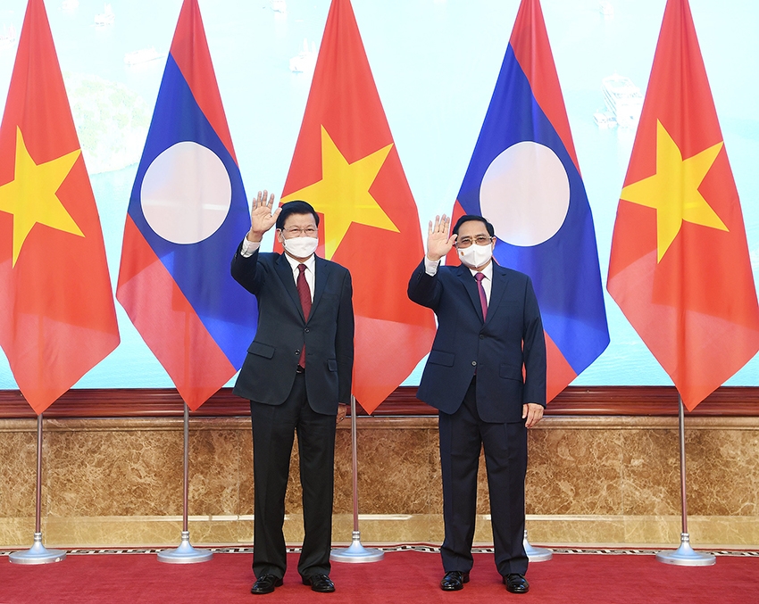 Thủ tướng Chính phủ Phạm Minh Chính và Tổng Bí thư, Chủ tịch nước Cộng hòa dân chủ nhân dân Lào Thongloun Sisoulith - Ảnh: VGP/Nhật Bắc