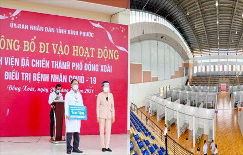 Chủ tịch Hội Nữ doanh nhân tỉnh Giang Thị Lan Thu (bìa phải) trao 1.000 bộ đồ bảo hộ y tế và 30.000 khẩu trang cho Bệnh viện dã chiến TP. Đồng Xoài. (Ảnh: Ngọc Quế)