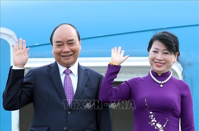Chủ tịch nước Nguyễn Xuân Phúc và Phu nhân tại sân bay Quốc tế Nội Bài. Ảnh : Thống Nhất/TTXVN
