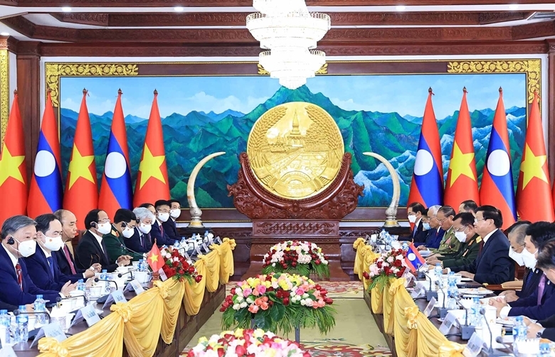 Chủ tịch nước Nguyễn Xuân Phúc hội đàm với Tổng Bí thư, Chủ tịch nước Lào Thongloun Sisoulith. (Ảnh: TTXVN) 