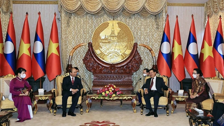 Chủ tịch nước Nguyễn Xuân Phúc hội đàm với Tổng Bí thư, Chủ tịch nước Lào Thongloun Sisoulith. (Ảnh: TTXVN) 