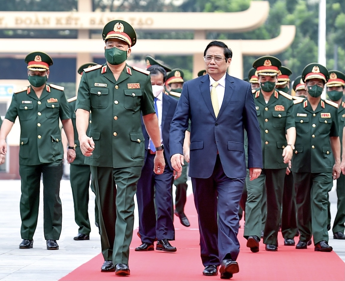 Thủ tướng Chính phủ Phạm Minh Chính tới dự lễ khai giảng năm học 2021-2022 của Học viện Quốc phòng. - Ảnh: VGP/Nhật Bắc