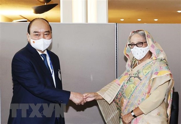 Chủ tịch nước Nguyễn Xuân Phúc gặp Thủ tướng Bangladesh Sheikh Hasina. (Ảnh: Thống Nhất/TTXVN)