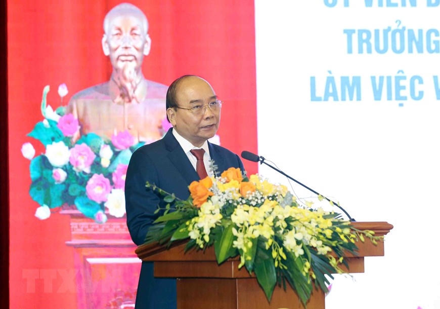 Chủ tịch nước Nguyễn Xuân Phúc: Đẩy mạnh cải cách tư pháp là xu thế tất yếu - Ảnh: TTXVN