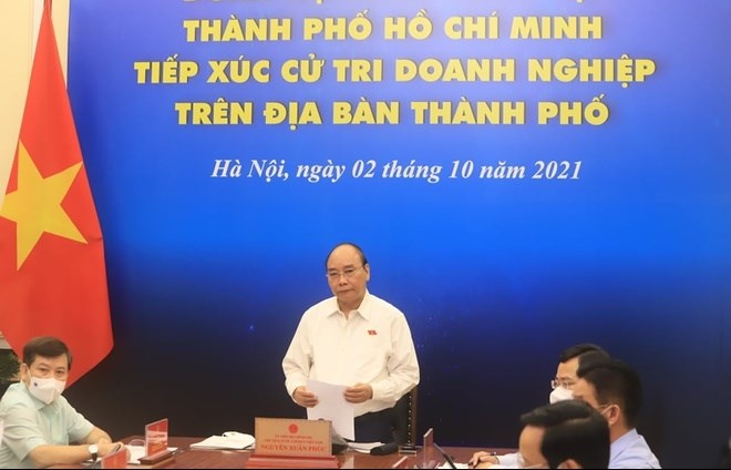 Chủ tịch nước Nguyễn Xuân Phúc tiếp xúc cử tri là doanh nghiệp TP.HCM