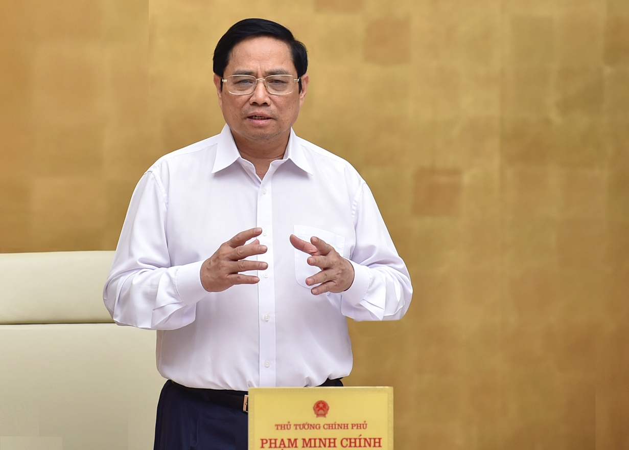 Thủ tướng Phạm Minh Chính nêu rõ việc phục hồi, mở cửa kinh tế phụ thuộc rất lớn vào phòng, chống dịch. Ảnh: VGP/Nhật Bắc