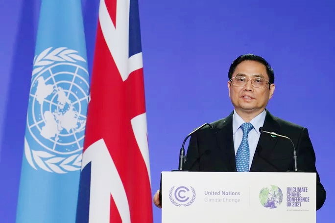 Thủ tướng Phạm Minh Chính phát biểu tại Hội nghị Thượng đỉnh khí hậu được tổ chức trong khuôn khổ COP26 - Ảnh: Reuters