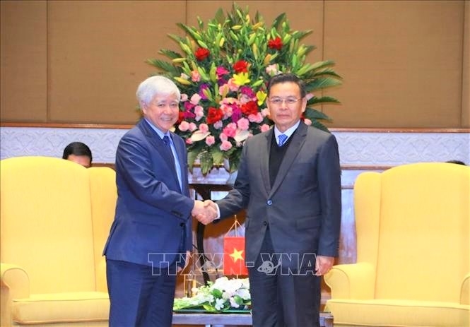 Chủ tịch Ủy ban Trung ương MTTQ Việt Nam Đỗ Văn Chiến và Chủ tịch Quốc hội Lào Saysomphone Phomvihane - Ảnh: TTXVN