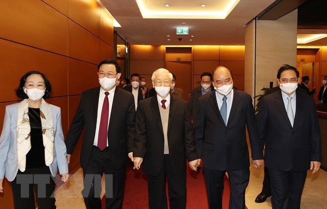 Tổng Bí thư Nguyễn Phú Trọng cùng các đồng chí lãnh đạo Đảng, Nhà nước đến dự Hội nghị. Ảnh: Trí Dũng/TTXVN