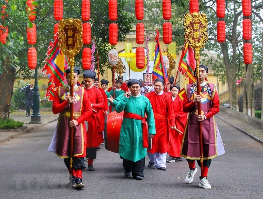 Đây là nghi lễ từ thời nhà Lê, triều đình tổ chức nghi lễ tiến Ngự lịch cho hoàng đế và ban lịch cho bách quan, muôn dân. (Ảnh: Tuấn Đức/TTXVN) (Ảnh: Tuấn Đức/TTXVN)