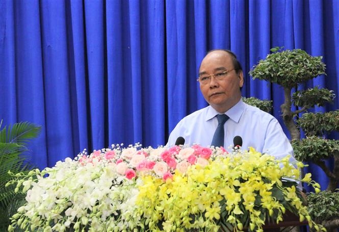 Chủ tịch nước Nguyễn Xuân Phúc phát biểu tại buổi trao quà. Ảnh: Công Mạo/TTXVN