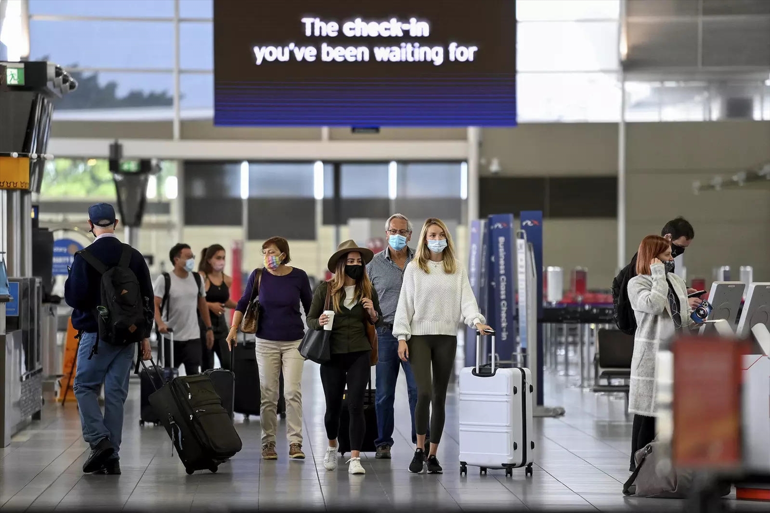 Hành khách tại sân bay quốc tế Sydney. Ảnh: Reuters