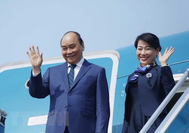 Chủ tịch nước Nguyễn Xuân Phúc và Phu nhân lên đường thăm cấp Nhà nước tới Cộng hoà Singapore. Ảnh: Thống Nhất/TTXVN