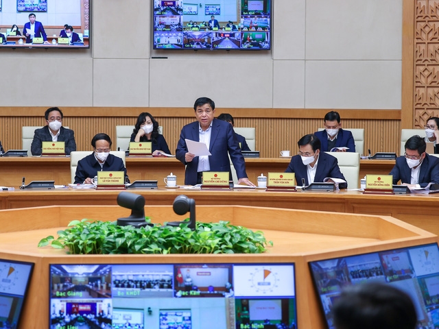Bộ trưởng Bộ Kế hoạch và Đầu tư Nguyễn Chí Dũng phát biểu tại phiên họp. Ảnh: VGP/Nhật Bắc