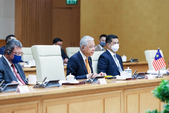 Thủ tướng Ismail Sabri Yaakob bày tỏ ấn tượng sâu sắc về những thành tích phát triển của Việt Nam thời gian qua. (Ảnh: VGP/Nhật Bắc)
