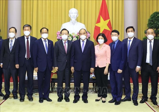 Chủ tịch nước Nguyễn Xuân Phúc với các đại biểu tại buổi tiếp. Ảnh: Thống Nhất/TTXVN