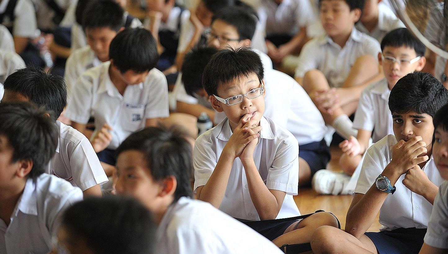 Trẻ em tại Singapore phải tham gia thi tốt nghiệp tiểu học (ảnh ST)