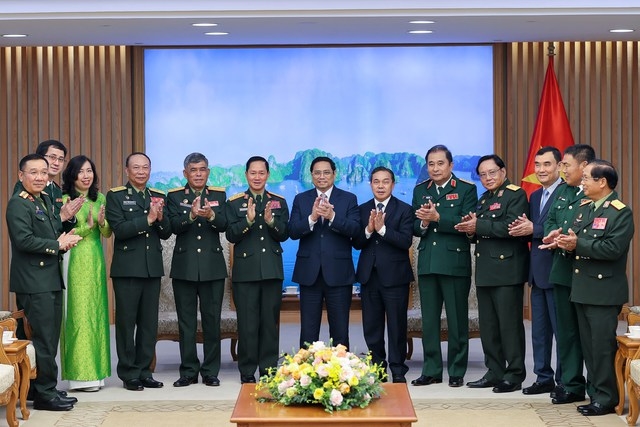 Thủ tướng Phạm Minh Chính và Đoàn đại biểu quân sự cấp cao QĐND Lào đang có chuyến thăm chính thức Việt Nam - Ảnh: VGP/Nhật Bắc