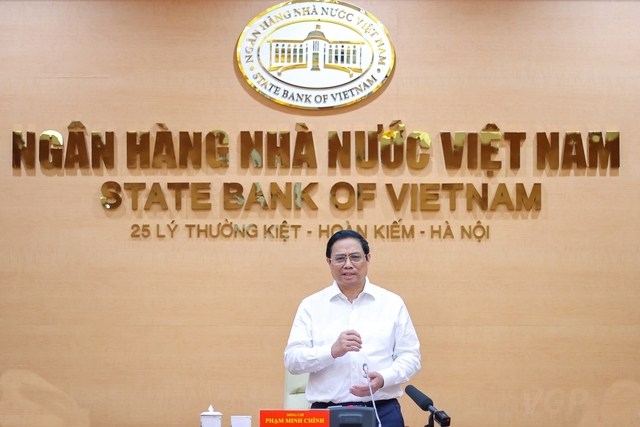 Thủ tướng Phạm Minh Chính bày tỏ mong muốn các ngân hàng thương mại cùng chia sẻ với Đảng, Nhà nước, nhân dân, tạo ra nguồn lực, sức mạnh phát triển mới - Ảnh: VGP/Nhật Bắc