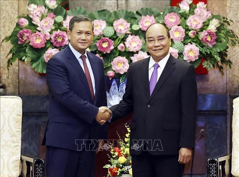 Chủ tịch nước Nguyễn Xuân Phúc đã tiếp Đại tướng Hun Manet, Phó Tổng tư lệnh kiêm Tư lệnh Lục quân Quân đội Hoàng gia Campuchia. (Ảnh: Thống Nhất/TTXVN)