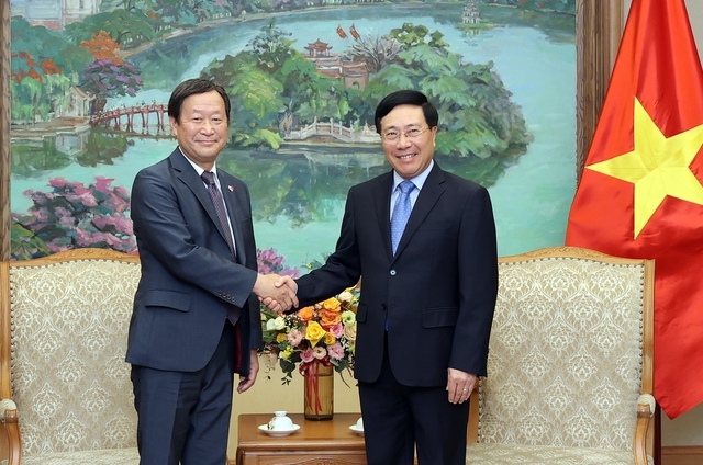 Phó Thủ tướng Thường trực Phạm Bình Minh tiếp Phó Chủ tịch điều hành cấp cao JICA Junichi Yamada - Ảnh: VGP/Hải Minh