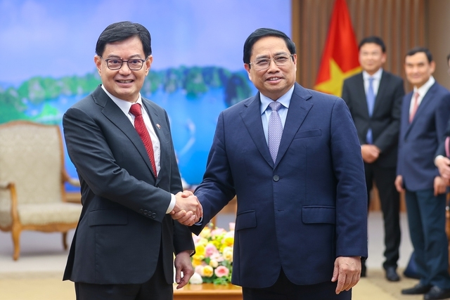 Thủ tướng Phạm Minh Chính và Phó Thủ tướng Singapore Vương Thụy Kiệt - Ảnh: VGP/Nhật Bắc