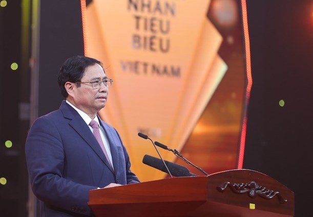 Thủ tướng Phạm Minh Chính phát biểu tại lễ kỷ niệm Ngày Doanh nhân Việt Nam và tôn vinh Doanh nhân Việt Nam tiêu biểu 2022 - Ảnh: VGP/Nhật Bắc