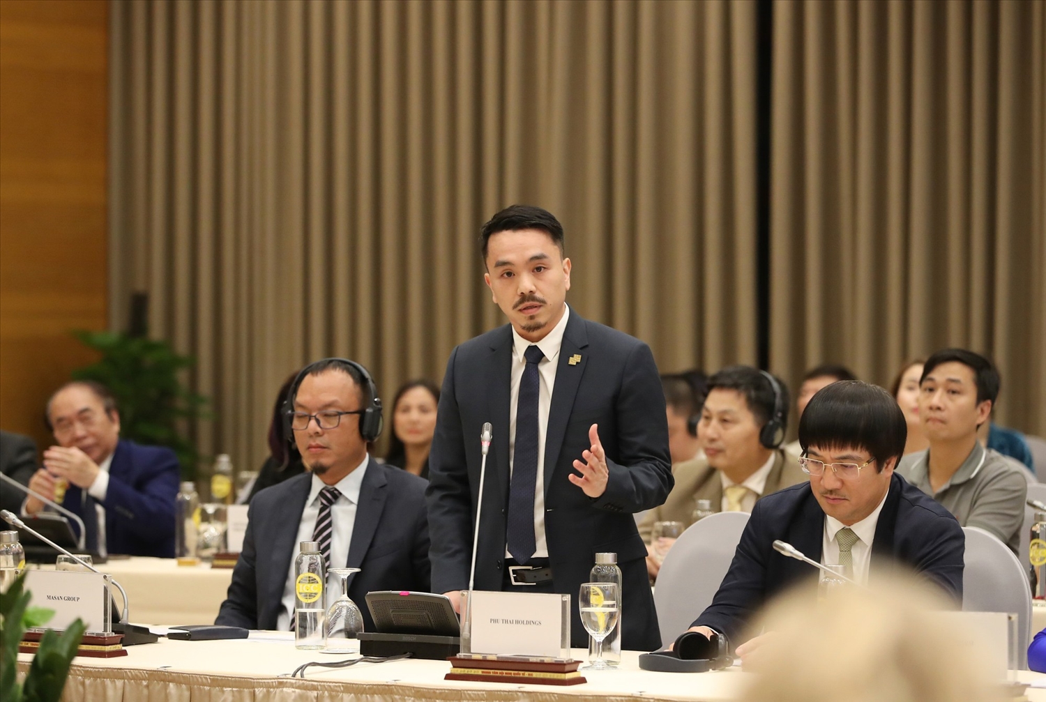 Đại diện doanh nghiệp chia sẻ tại Hội nghị - Ảnh: VGP/Nhật Bắc