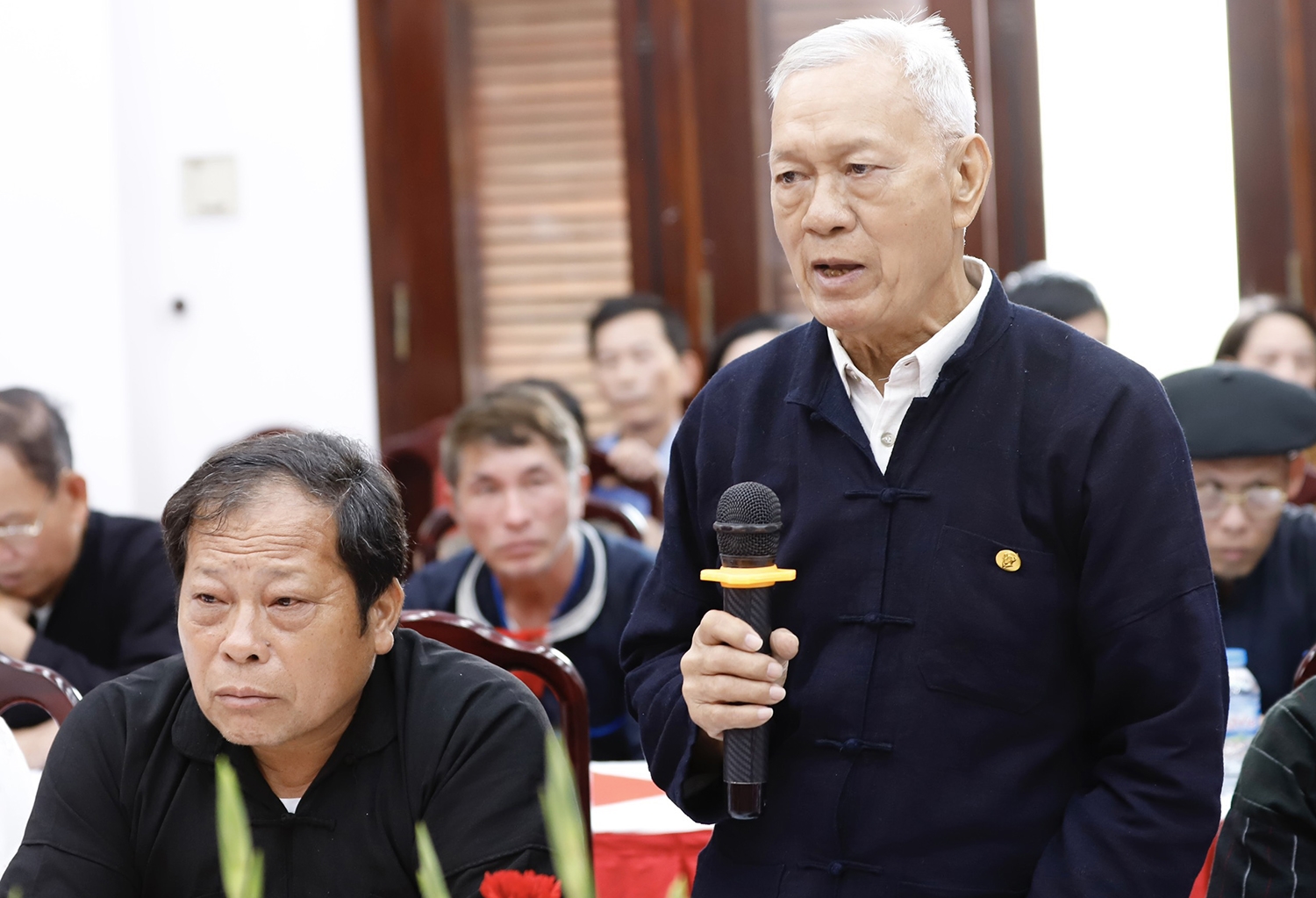 Ông Nùng Văn Chiến - đại diện cho dân tộc Thái tỉnh Sơn La chia sẻ tại Hội nghị 