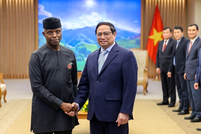 Thủ tướng Phạm Minh Chính và Phó Tổng thống Cộng hòa Liên bang Nigeria Yemi Osinbajo - Ảnh: VGP/Nhật Bắc