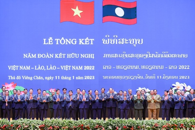 Đoàn đại biểu Việt Nam và Lào tại Lễ tổng kết Năm đoàn kết hữu nghị Việt Nam-Lào, Lào-Việt Nam 2022 - Ảnh: VGP/Nhật Bắc