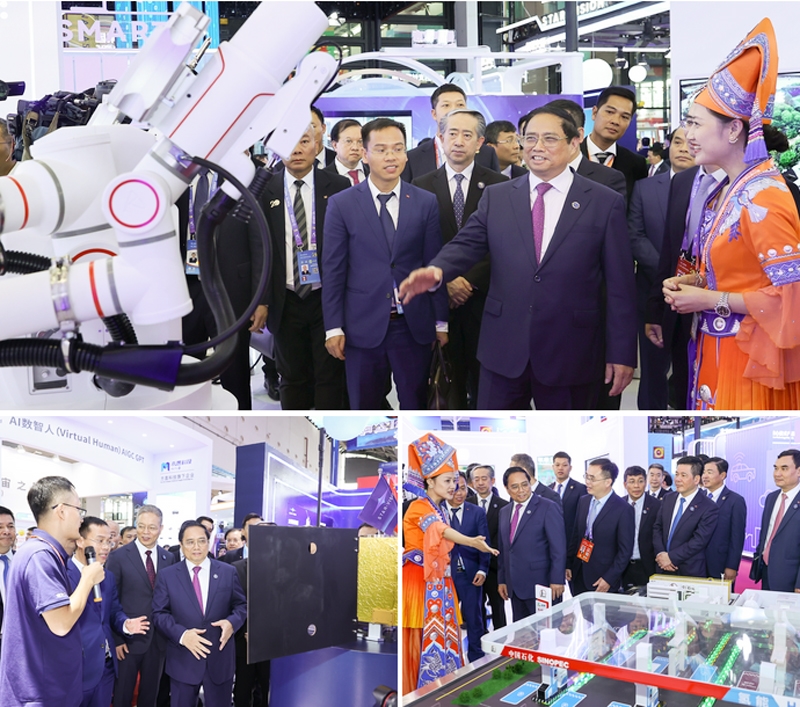 Thủ tướng thăm gian hàng trưng bày sản phẩm công nghệ cao của Trung Quốc - Ảnh: VGP/Nhật Bắc
